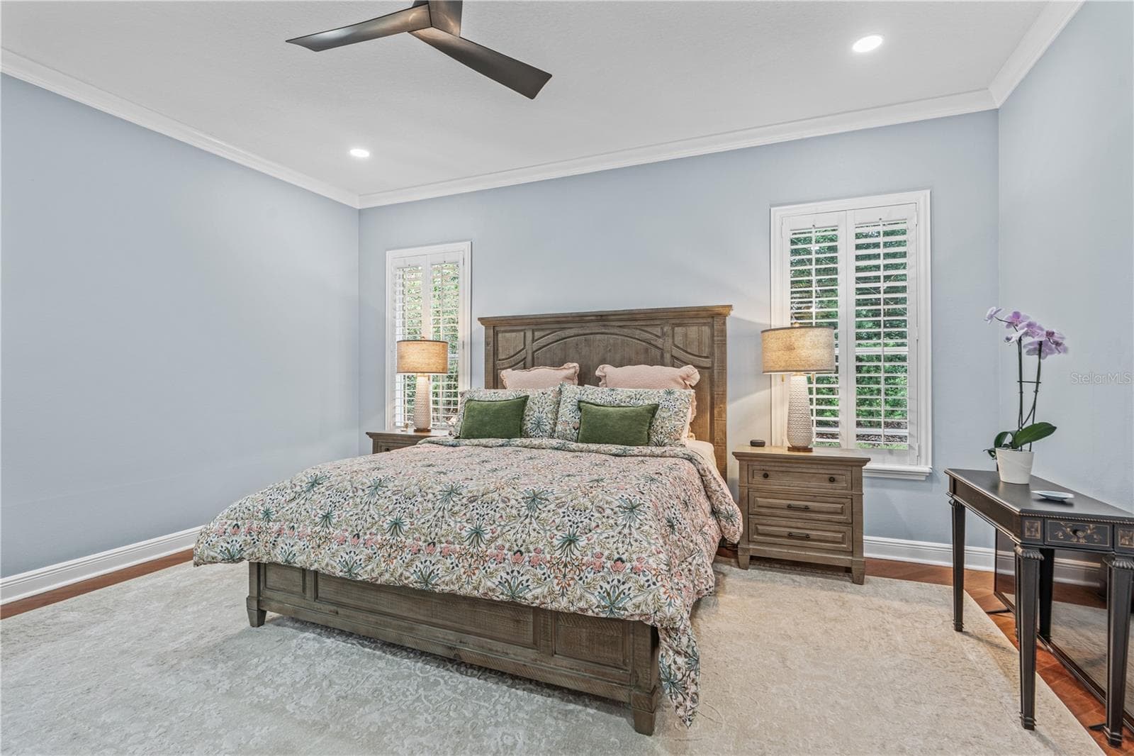 The primary bedroom windows overlook the back yard-- which is very private due to mature landscaping and trees - 520 SOTHEBY WAY, DEBARY