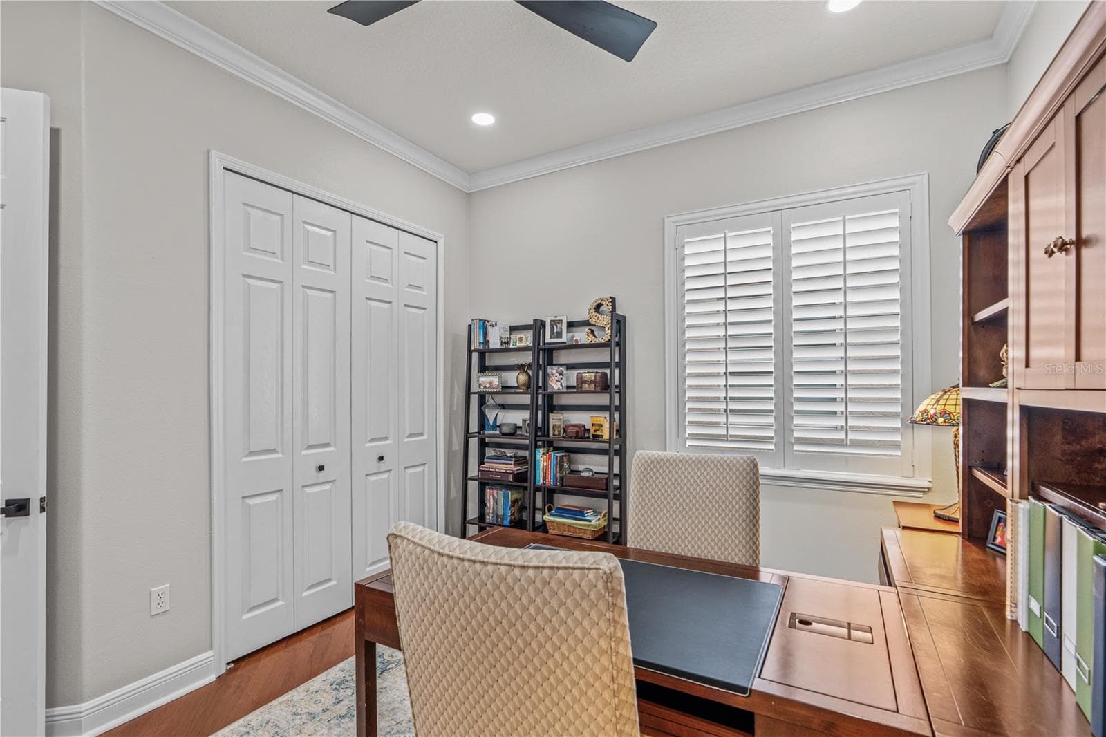 Looking toward the large window and closets; The closet has heavy-duty brackets & shelving and provides lots of storage options - 520 SOTHEBY WAY, DEBARY
