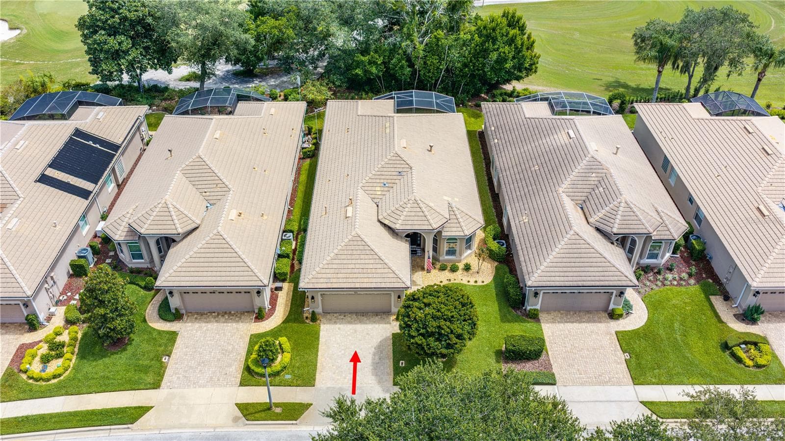 Overhead view showing tree buffer behind the home and golf course - 520 SOTHEBY WAY, DEBARY