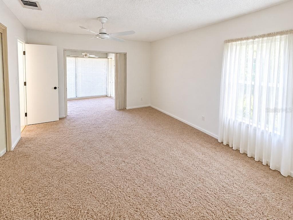 Single Family Residence at 2942 MACALPIN DR W, PALM HARBOR, photo 4 of 14