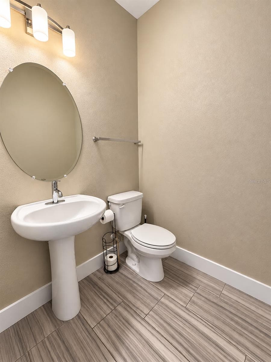 downstairs half bath - 8734 WINNING FIELDS RD, NEW PORT RICHEY