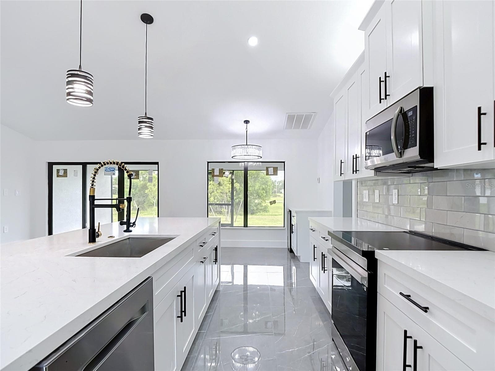 Another view of the kitchen cabinetry - 3613 NW 47TH LN, CAPE CORAL
