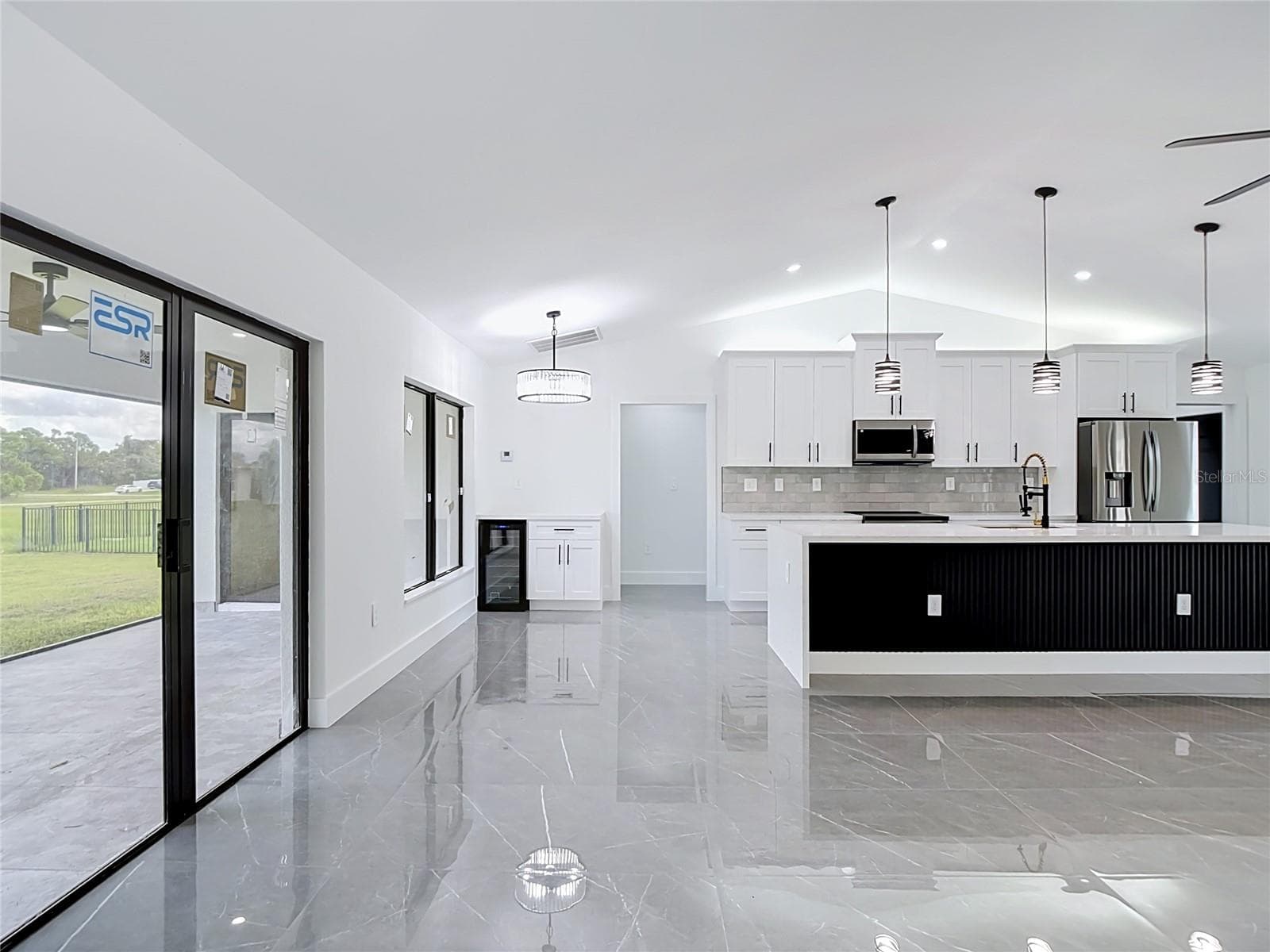 Another view of the dining area & kitchen - 3613 NW 47TH LN, CAPE CORAL