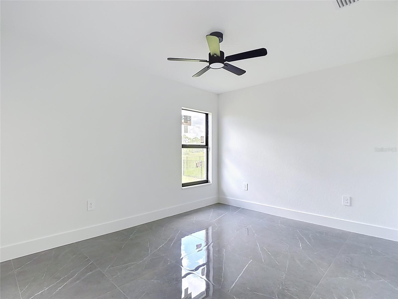 One of 4 bedrooms. All bedrooms feature overhead fans - 3613 NW 47TH LN, CAPE CORAL