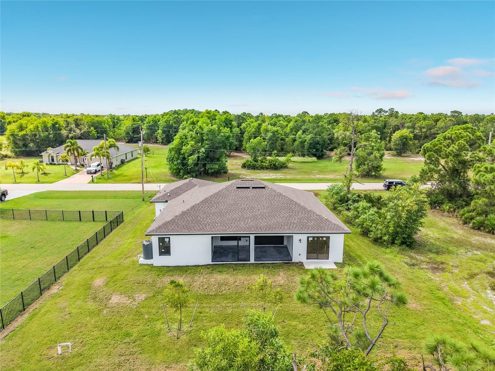 View of the Back of the house with plenty of room for a pool - 3613 NW 47TH LN, CAPE CORAL