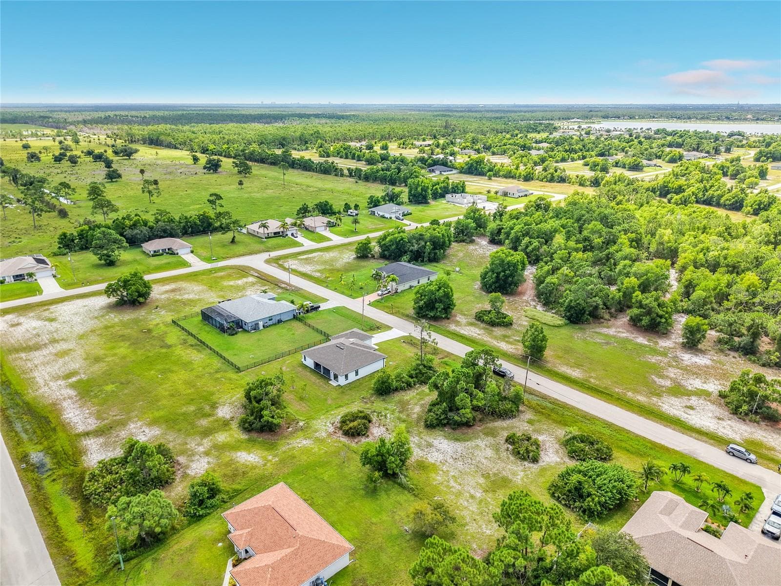 View of up & coming area with large lots - 3613 NW 47TH LN, CAPE CORAL