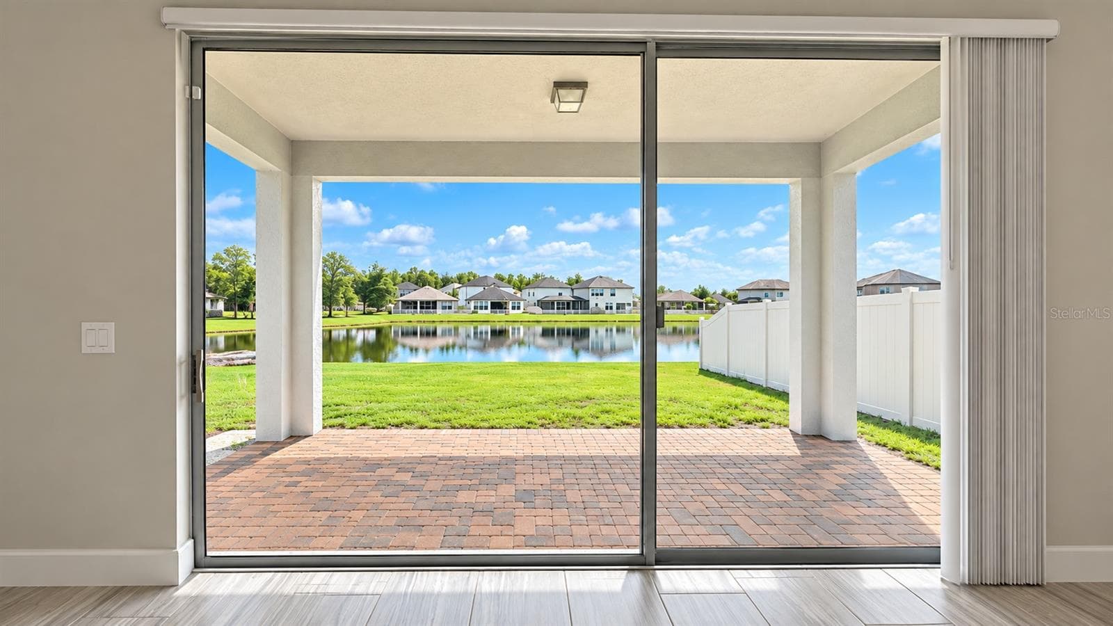 living room view outside - 8734 WINNING FIELDS RD, NEW PORT RICHEY