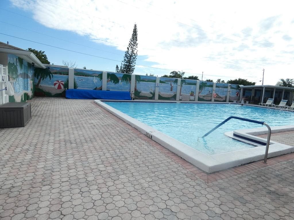 Heated Pool at The Club House - 4322 TAHITIAN GARDENS CIR #B, HOLIDAY