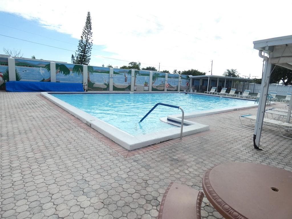Heated Pool at The Club House - 4322 TAHITIAN GARDENS CIR #B, HOLIDAY