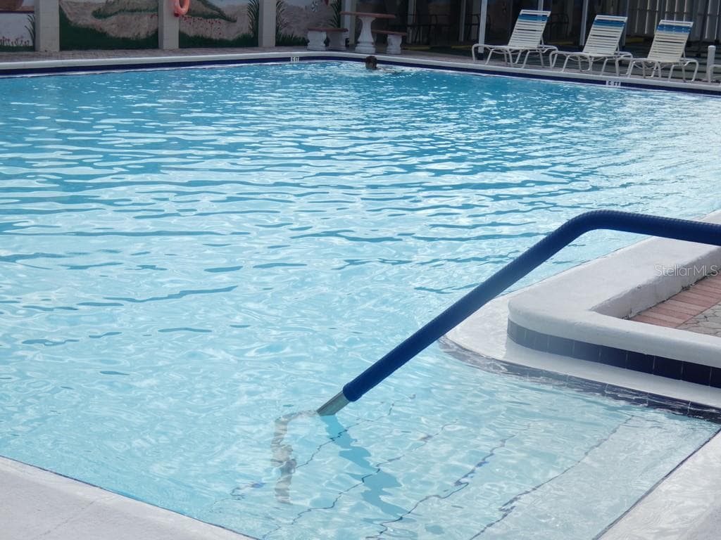Heated Pool at The Club House - 4322 TAHITIAN GARDENS CIR #B, HOLIDAY