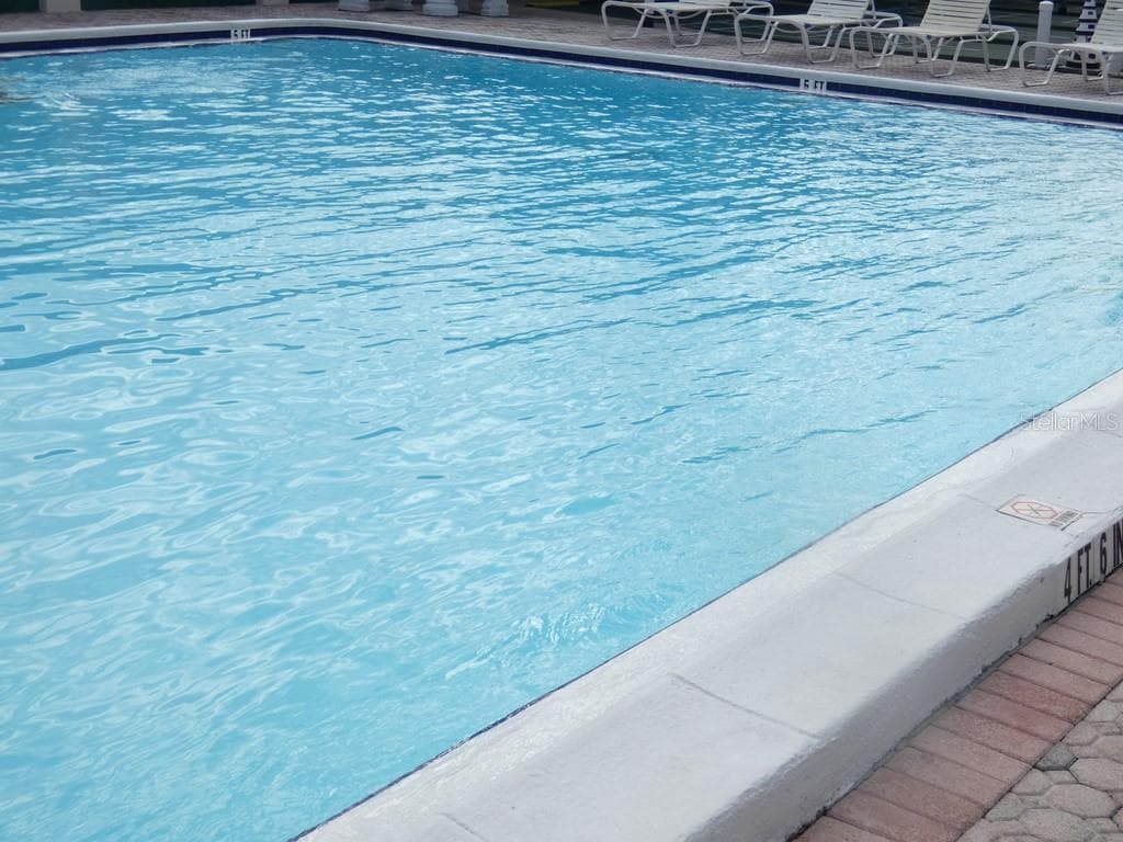Heated Pool at The Club House - 4322 TAHITIAN GARDENS CIR #B, HOLIDAY