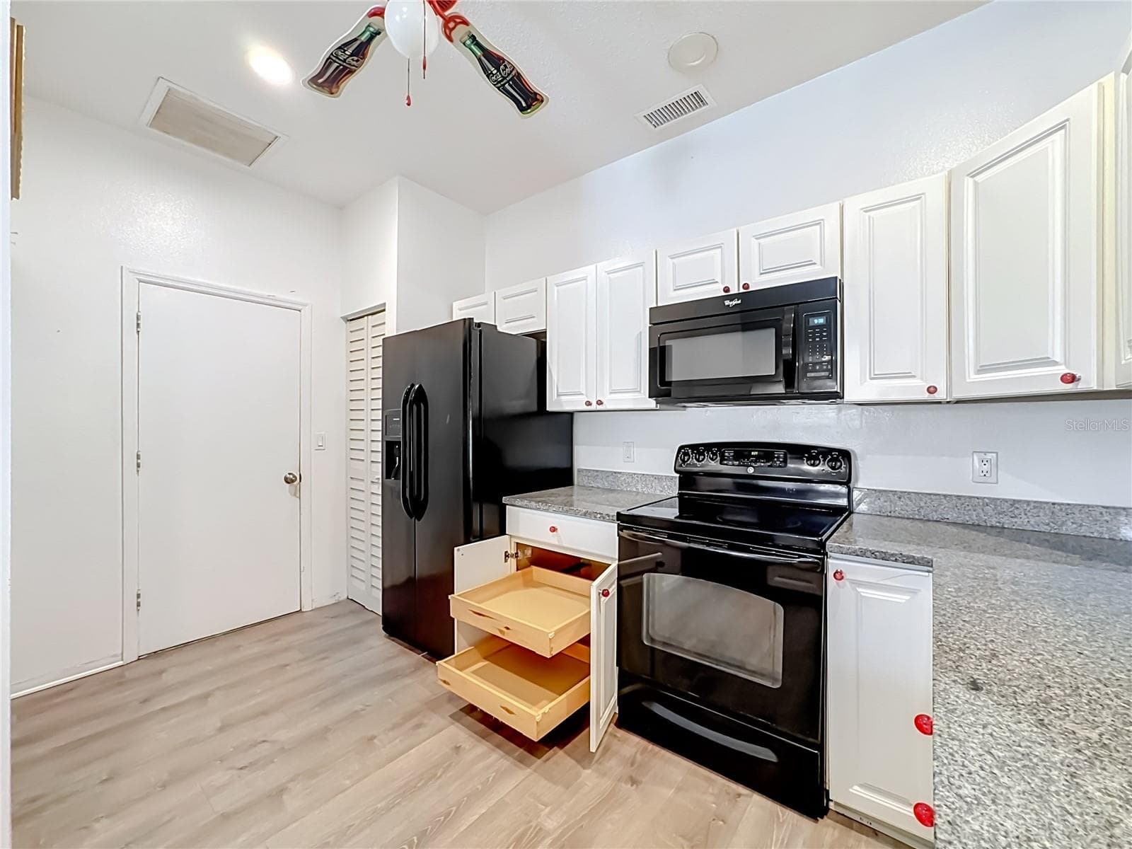 Convenience of roll-out shelves in cabinet. - 3308 60TH AVE W, BRADENTON