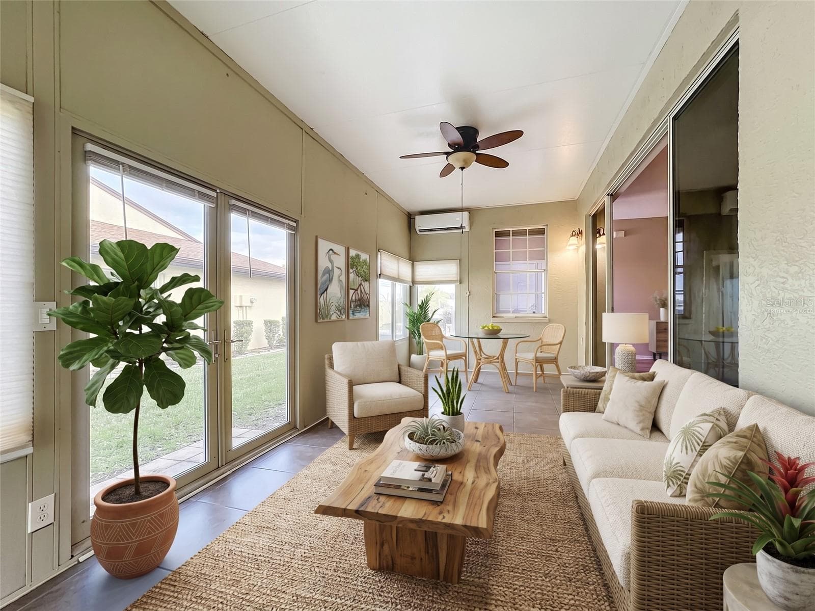 Virtually Staged -- Air Conditioned Florida Room with Mini Split AC (2025), adding 280 sq. ft. of comfortable living space. - 3308 60TH AVE W, BRADENTON