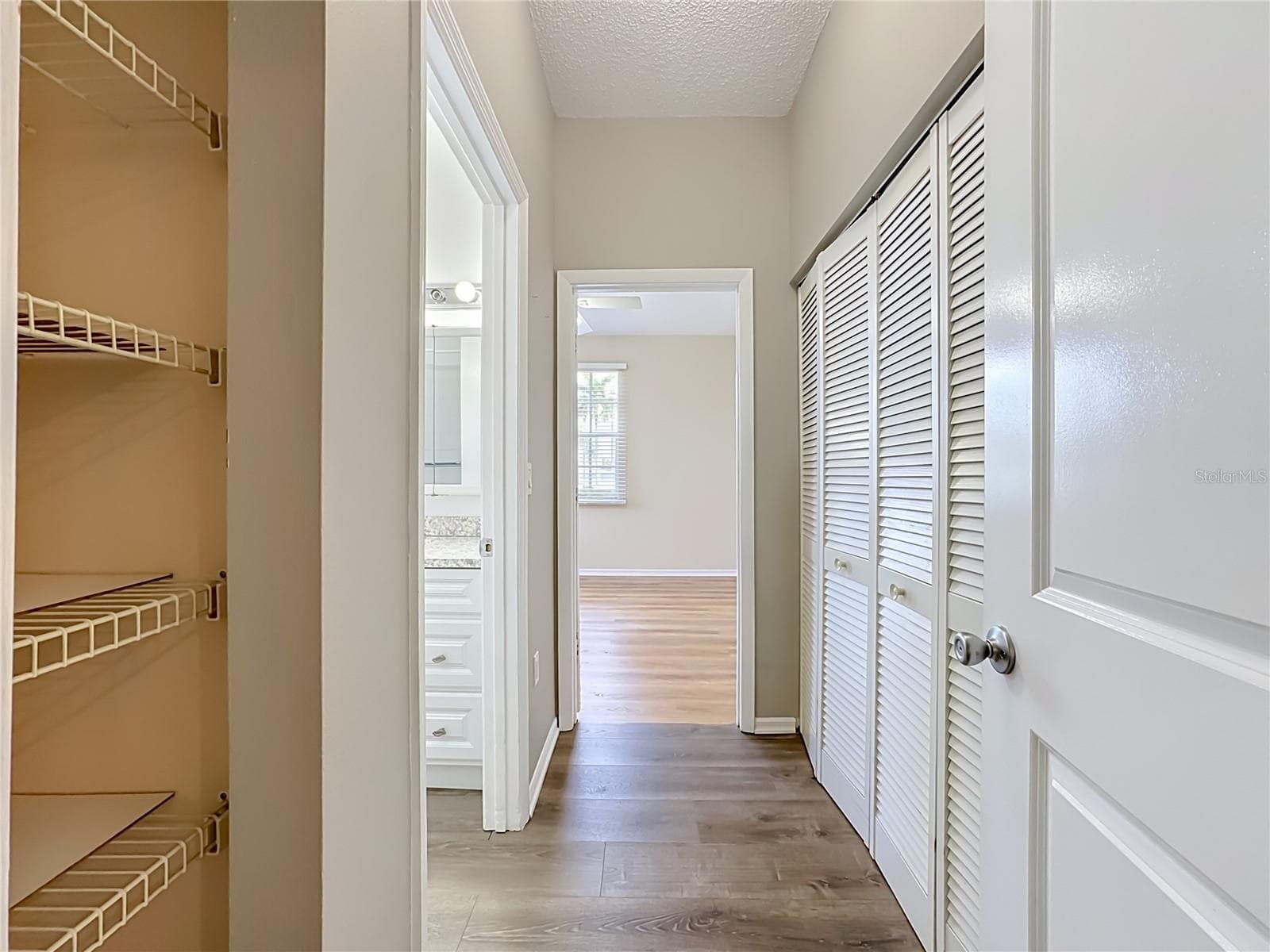 Hallway to guest bedroom. - 3308 60TH AVE W, BRADENTON