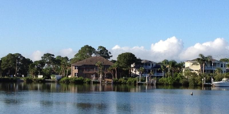 OZONA is a laid-back waterfront community where boating, golf carts, and Gulf Coast living are part of everyday life. - 201 SOUTH ST, PALM HARBOR