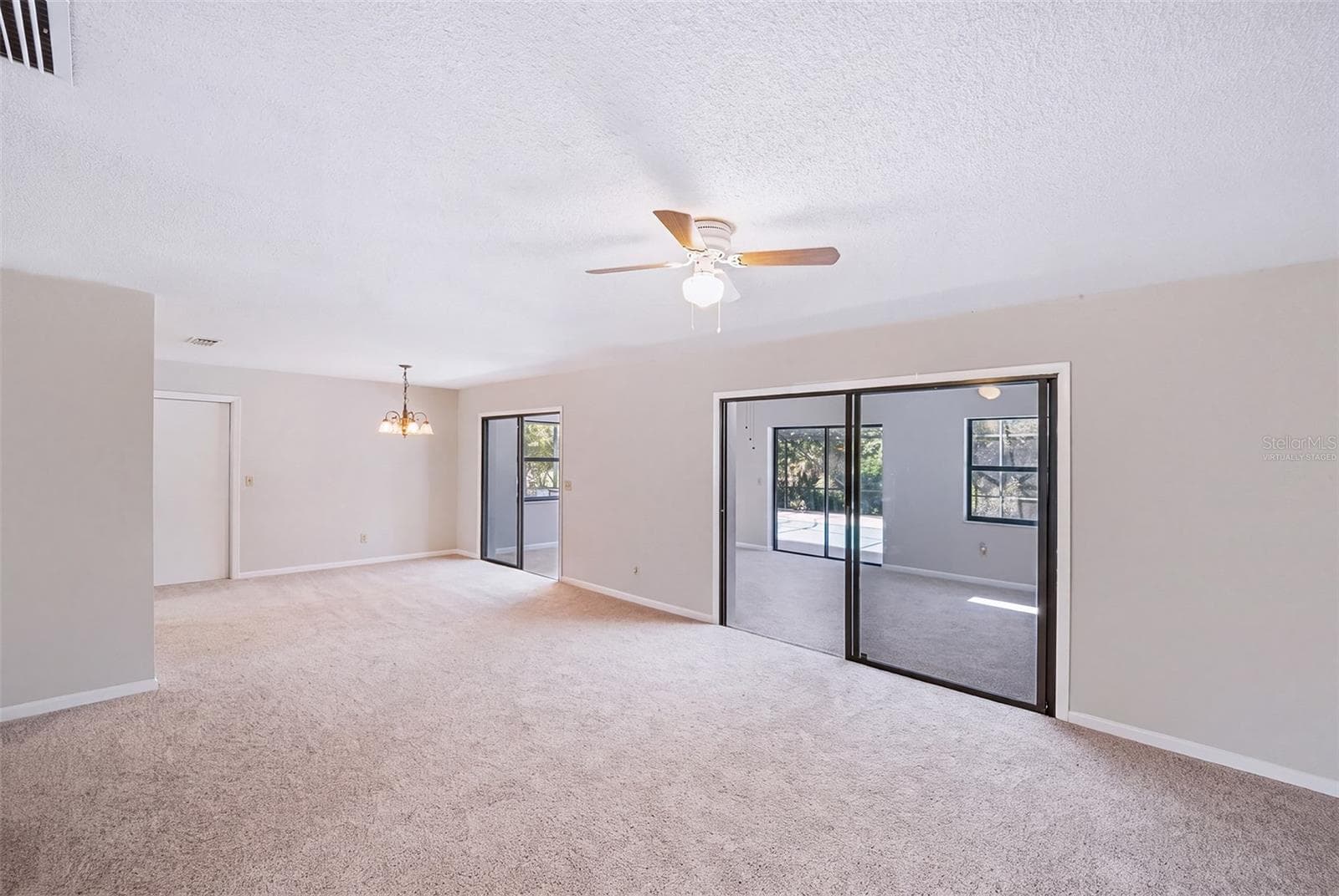 Virtually staged without any furniture - 83 FARRAGUT DR, PALM COAST
