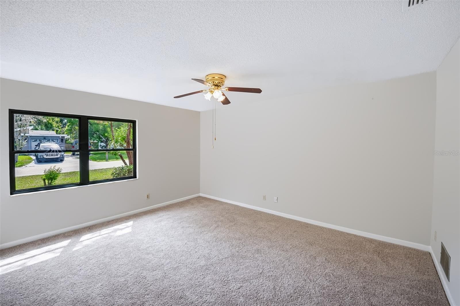 View to front of house from Master bedroom - 83 FARRAGUT DR, PALM COAST