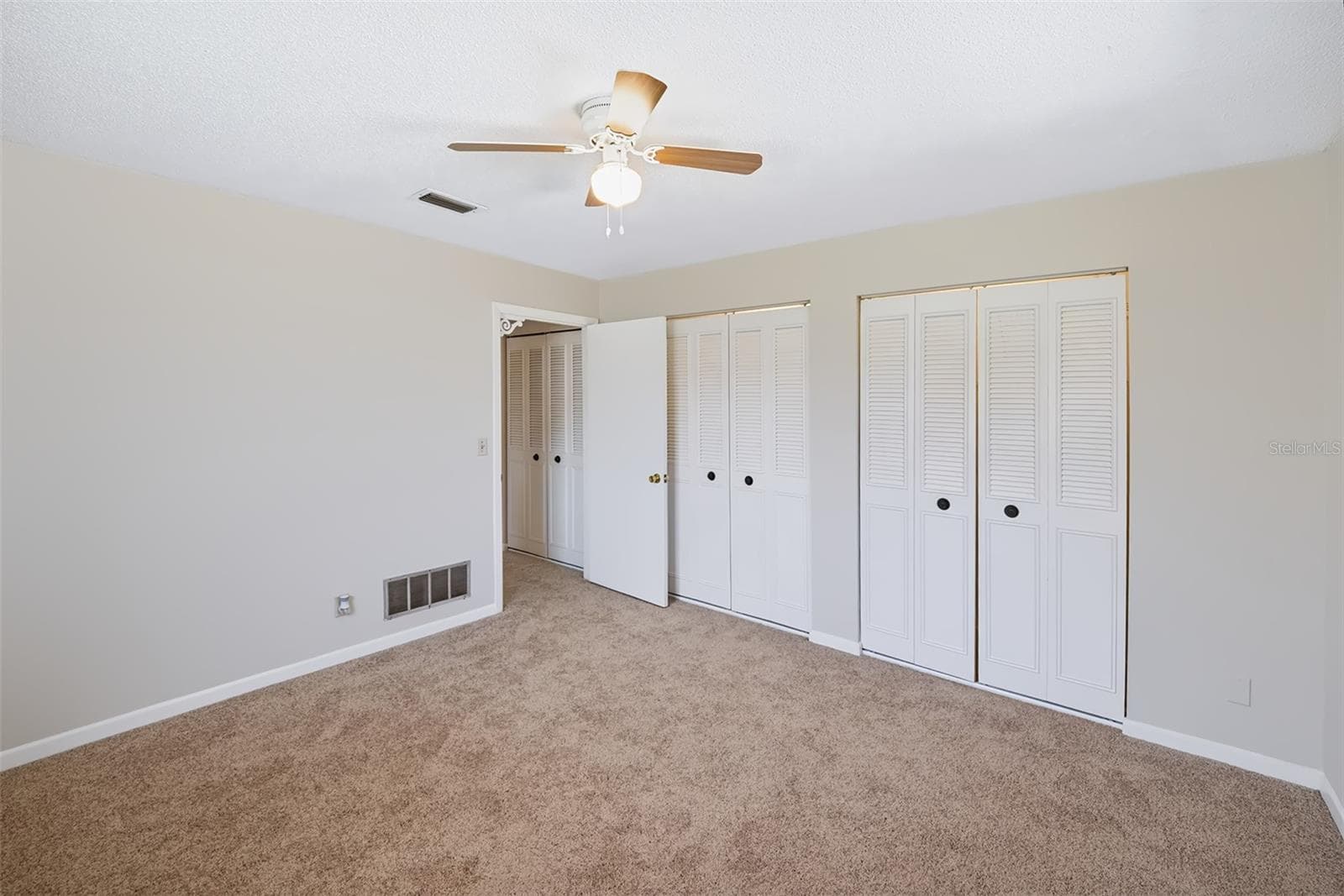 Another view of secondary bedroom - 83 FARRAGUT DR, PALM COAST