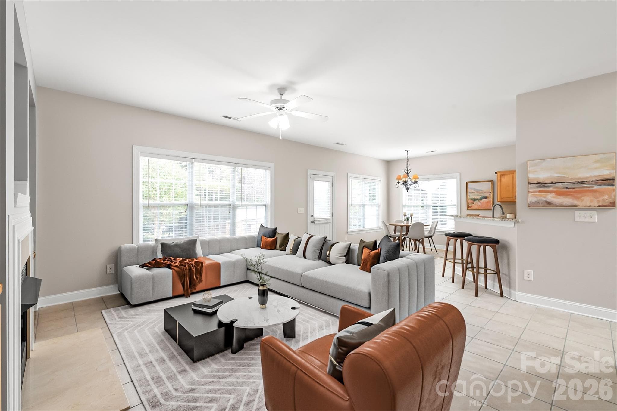 The open living space flows effortlessly into the chef's kitchen and sunny breakfast nook, creating a cohesive hub for casual morning coffee and vibrant evening gatherings. Virtually Staged. - 2008 Trace Creek Drive, Waxhaw