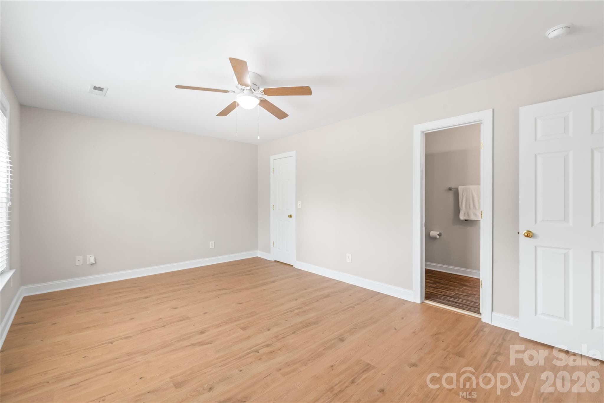 Versatile and full of potential, Bedroom 3 doubles as a fantastic bonus room...complete with a spacious walk-in closet and direct, private access to a full bathroom. - 2008 Trace Creek Drive, Waxhaw