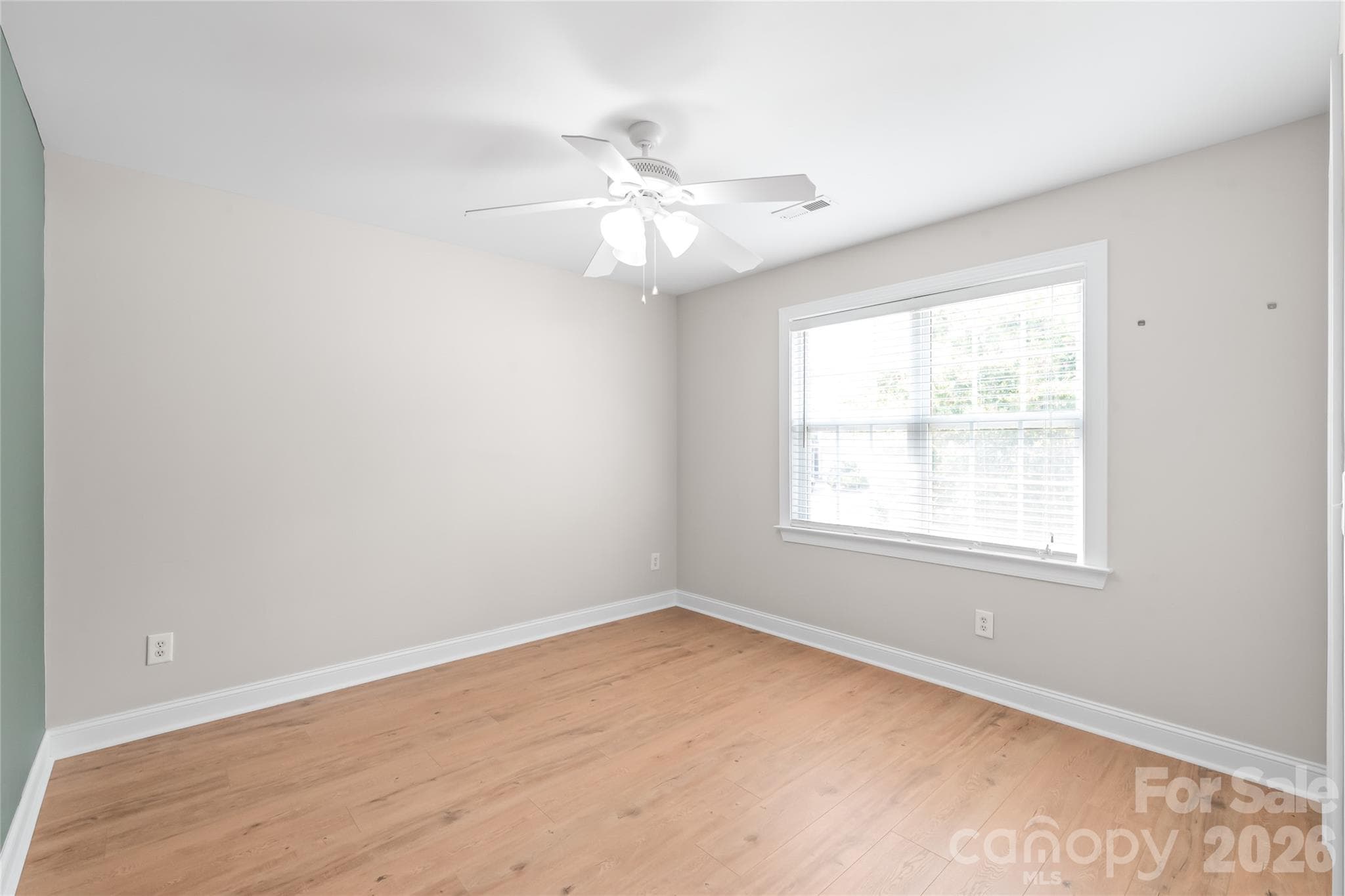 Spacious and smart on storage, Bedroom 5 features a dedicated walk-in closet...offering plenty of space for a full guest setup, home office, or growing family needs. - 2008 Trace Creek Drive, Waxhaw