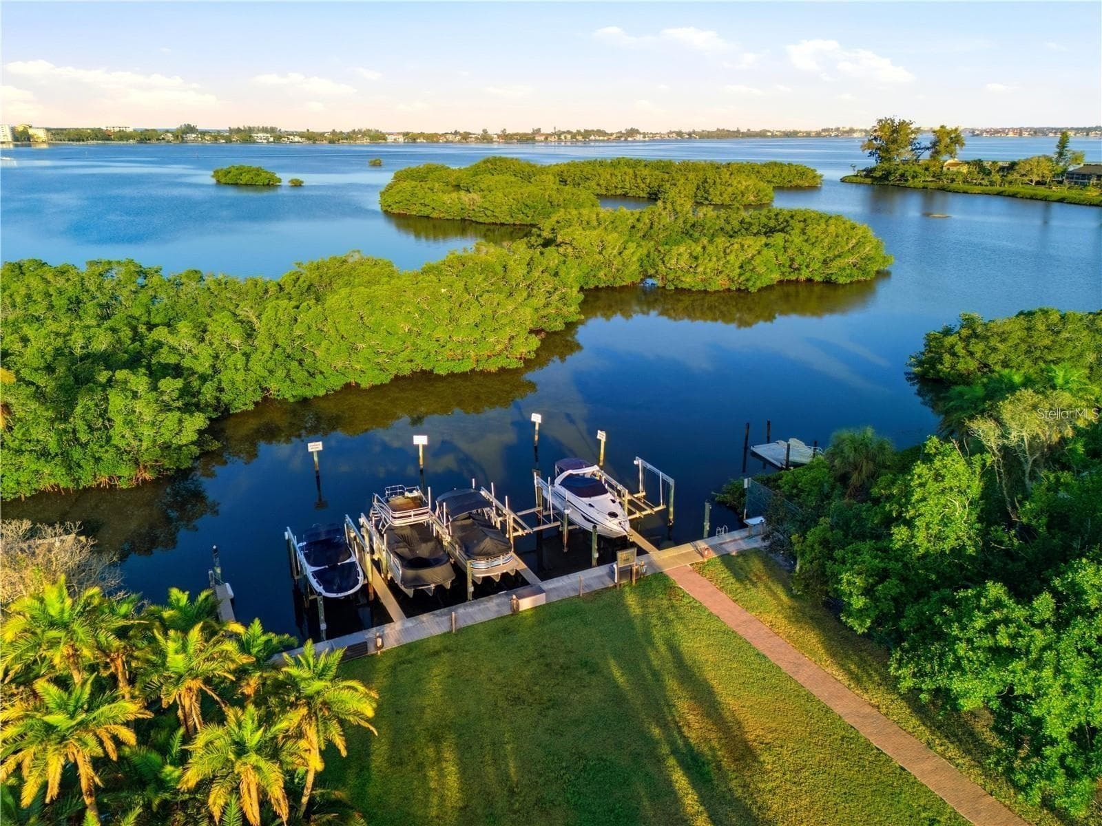 Community deeded access to the day dock by reservation, and a boat slip may become available for purchase. - 1740 ASSISI DR, SARASOTA