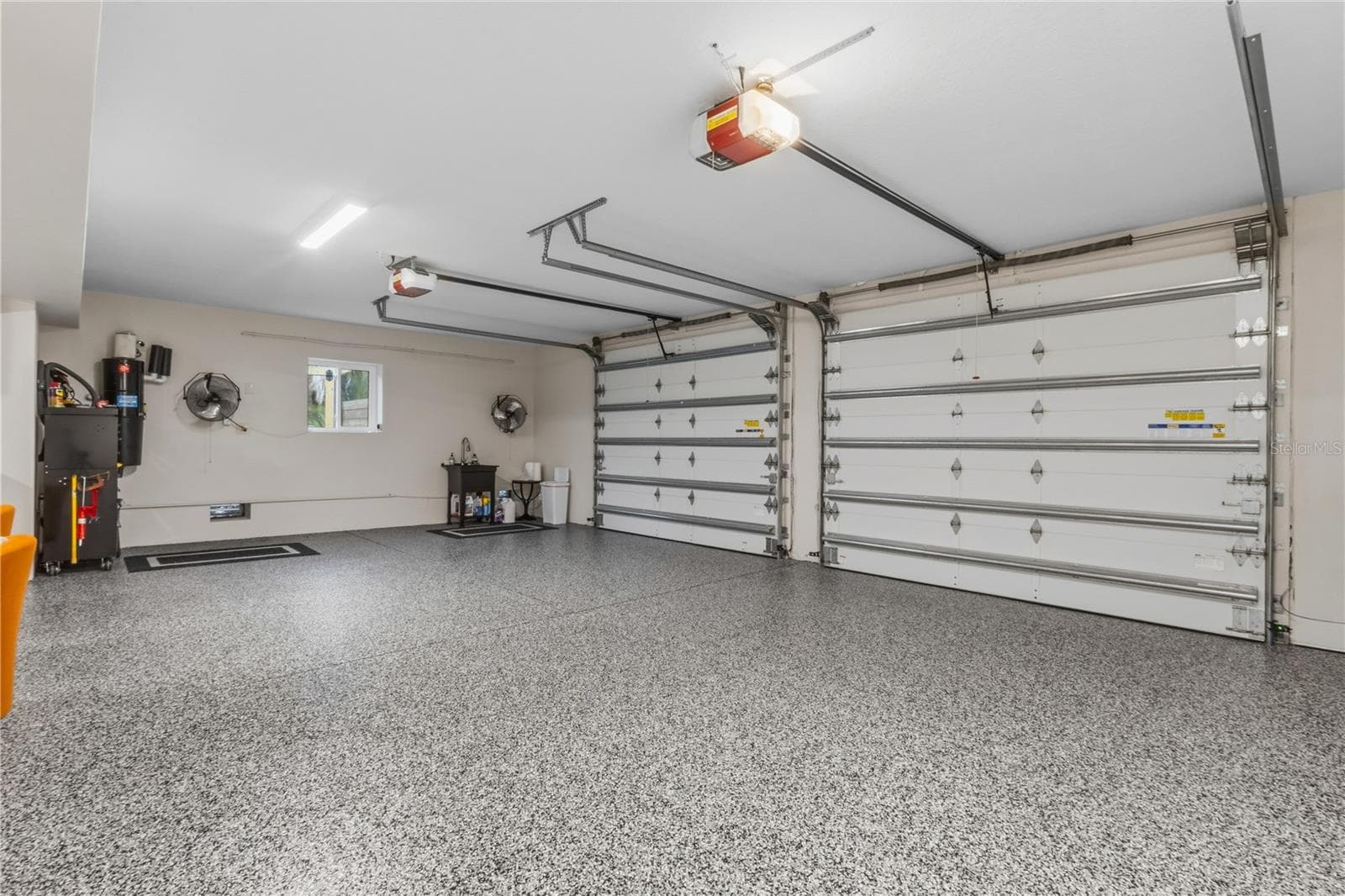 6-Car Garage — A Car Enthusiast’s Dream - 107 SUNSET DR, NOKOMIS