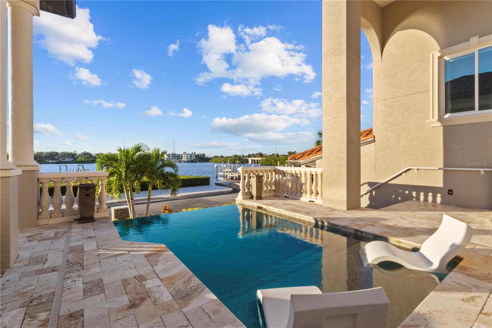A Poolside Setting Made for Entertaining - 107 SUNSET DR, NOKOMIS