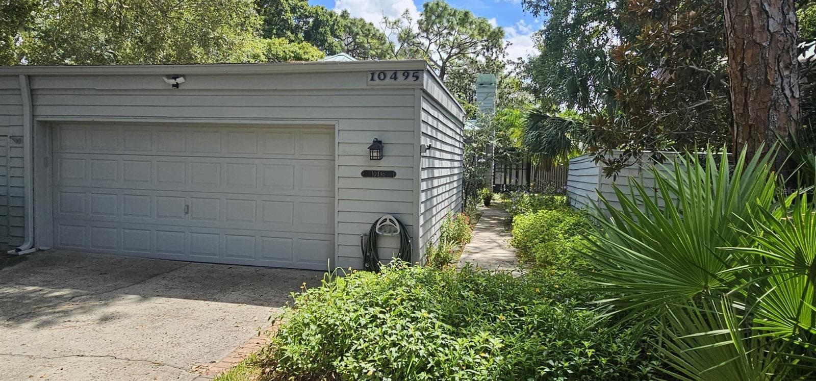 Single Family Residence at 10495 LONGWOOD DR, LARGO, photo 3 of 82