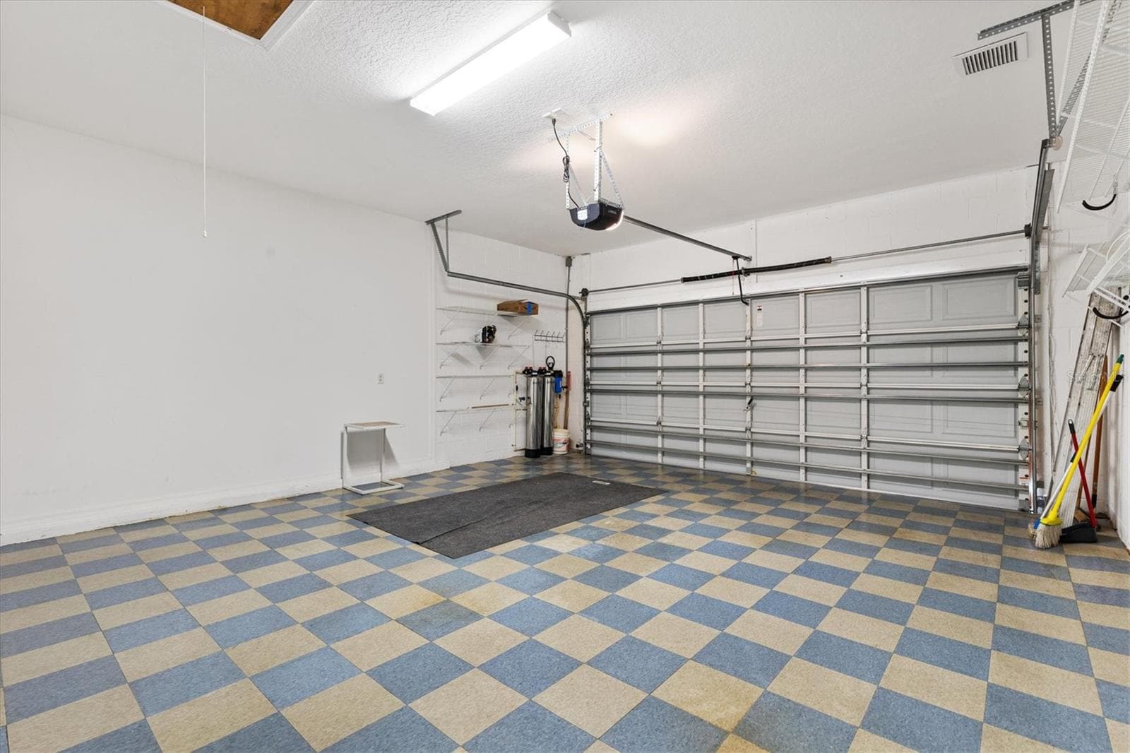 GARAGE FLOORING - 1025 WINNSBORO DR, THE VILLAGES