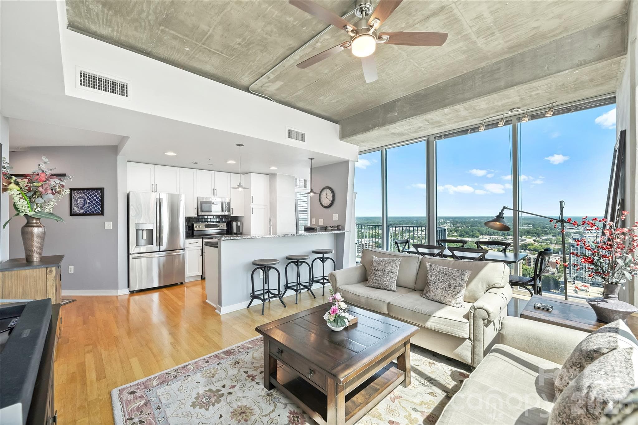 Open living space with increased ceiling height unique to this level - 210 N Church Street, Charlotte