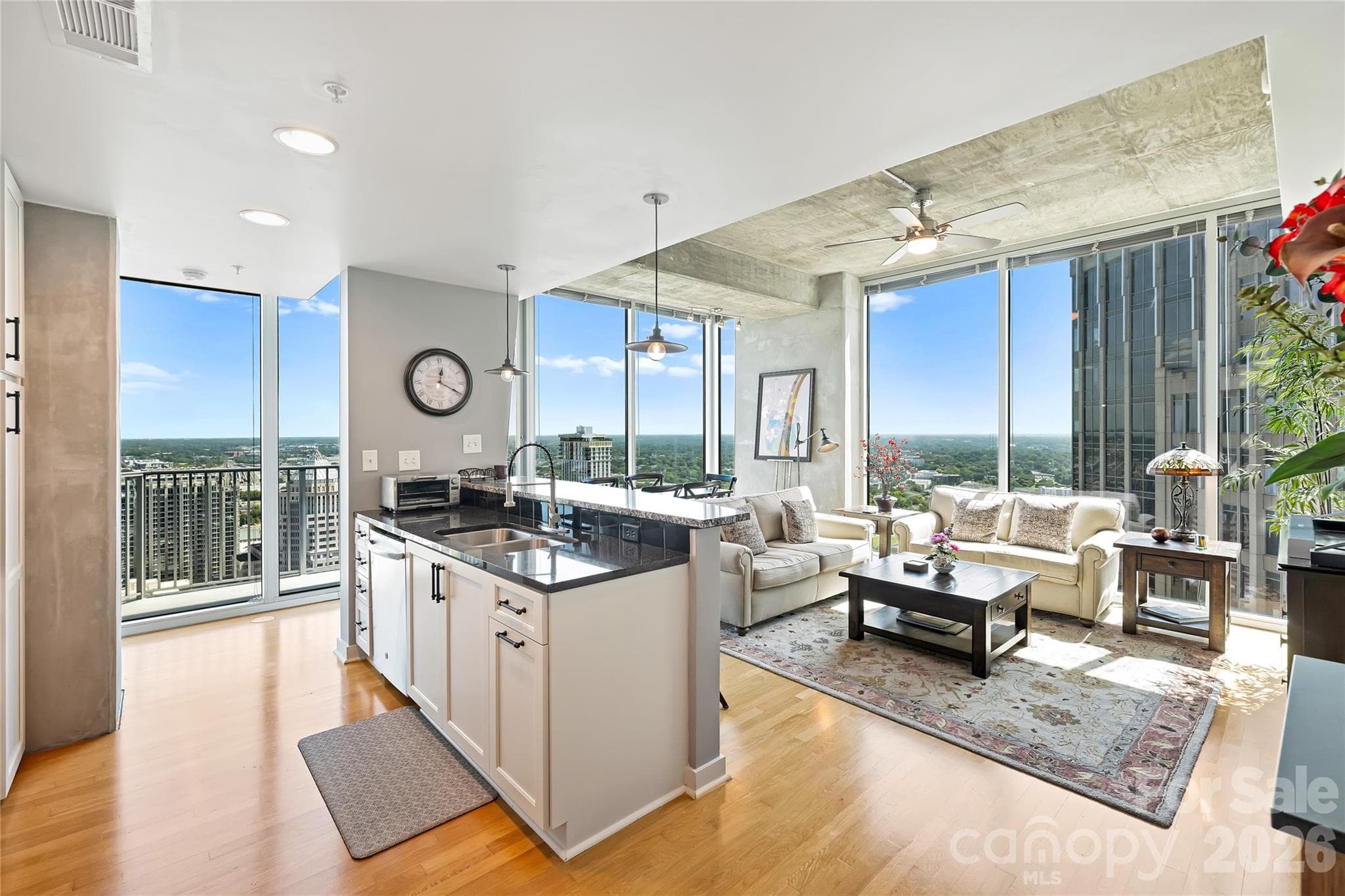 Open dining and living spaces designed around the views - 210 N Church Street, Charlotte
