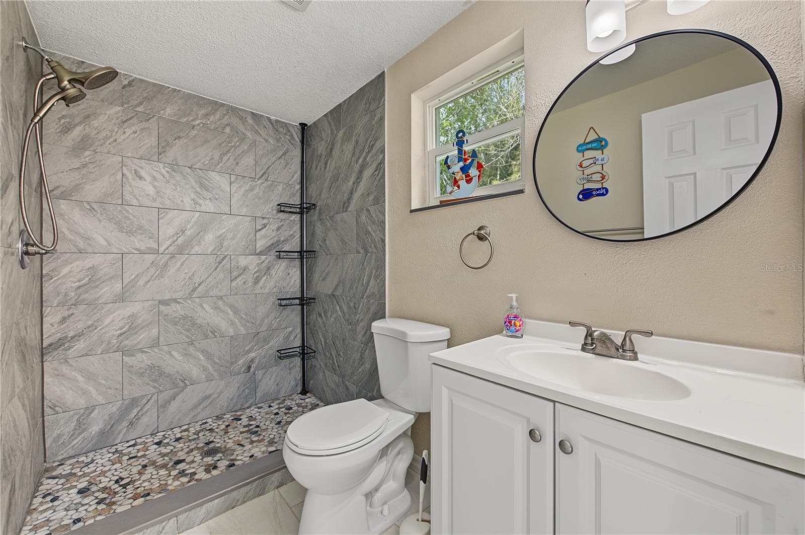 Bathroom in First Floor Studio Unit - Unit 2 - 5117 Mallett Drive - 5117 MALLETT DR, PORT RICHEY