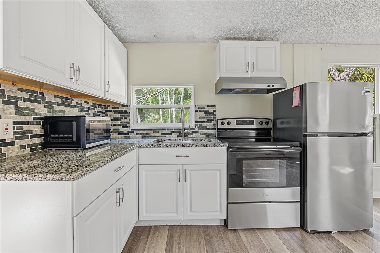 Kitchen in Second Floor Unit - Unit 2 - 5117 Mallett Drive - 5117 MALLETT DR, PORT RICHEY