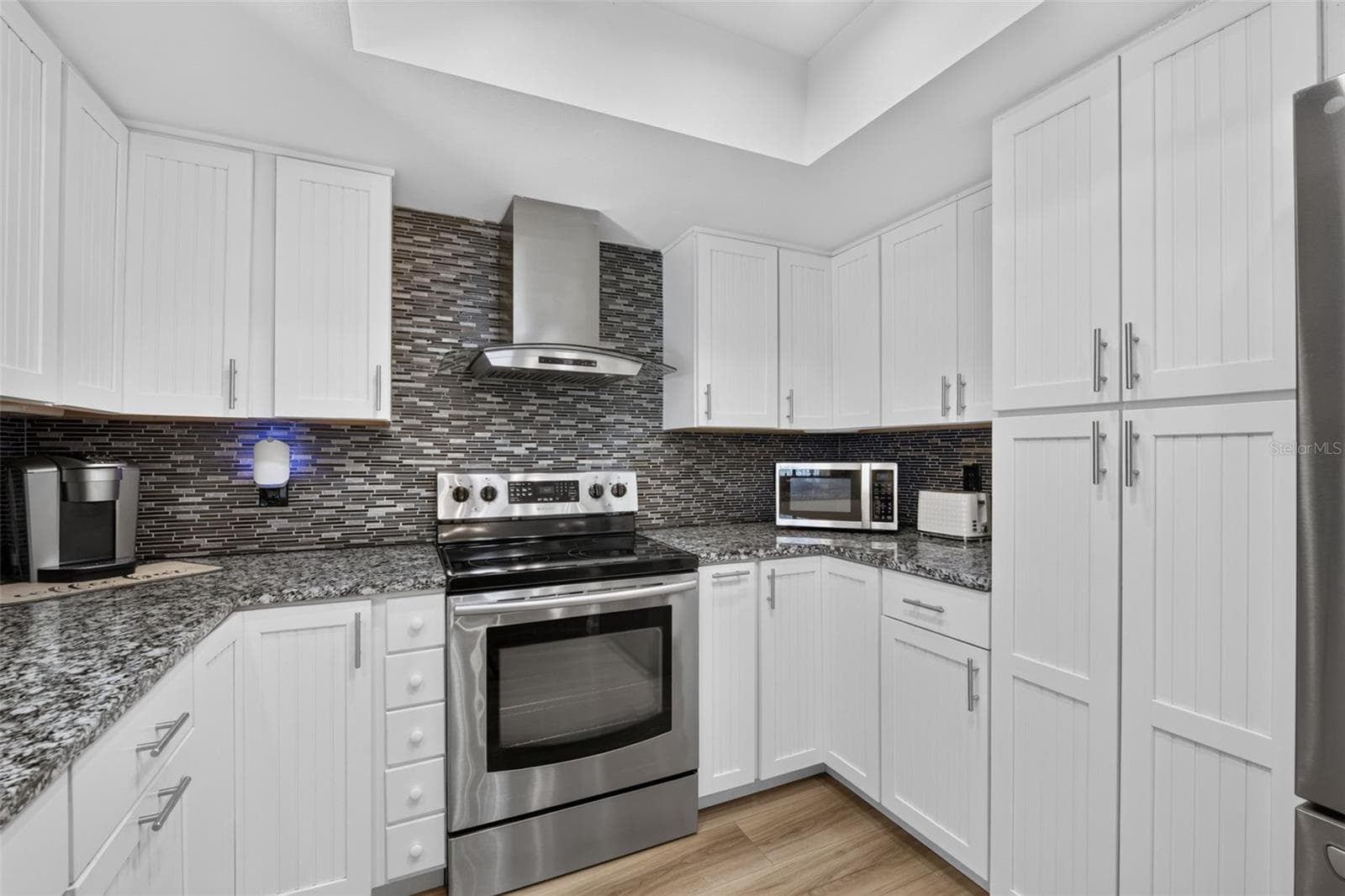 Plenty of cabinet space in this updated kitchen - 82 CIRCLEWOOD DR #A3-4, VENICE