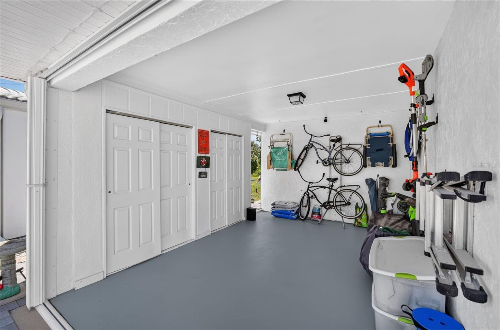 Carport with storage closets - 82 CIRCLEWOOD DR #A3-4, VENICE
