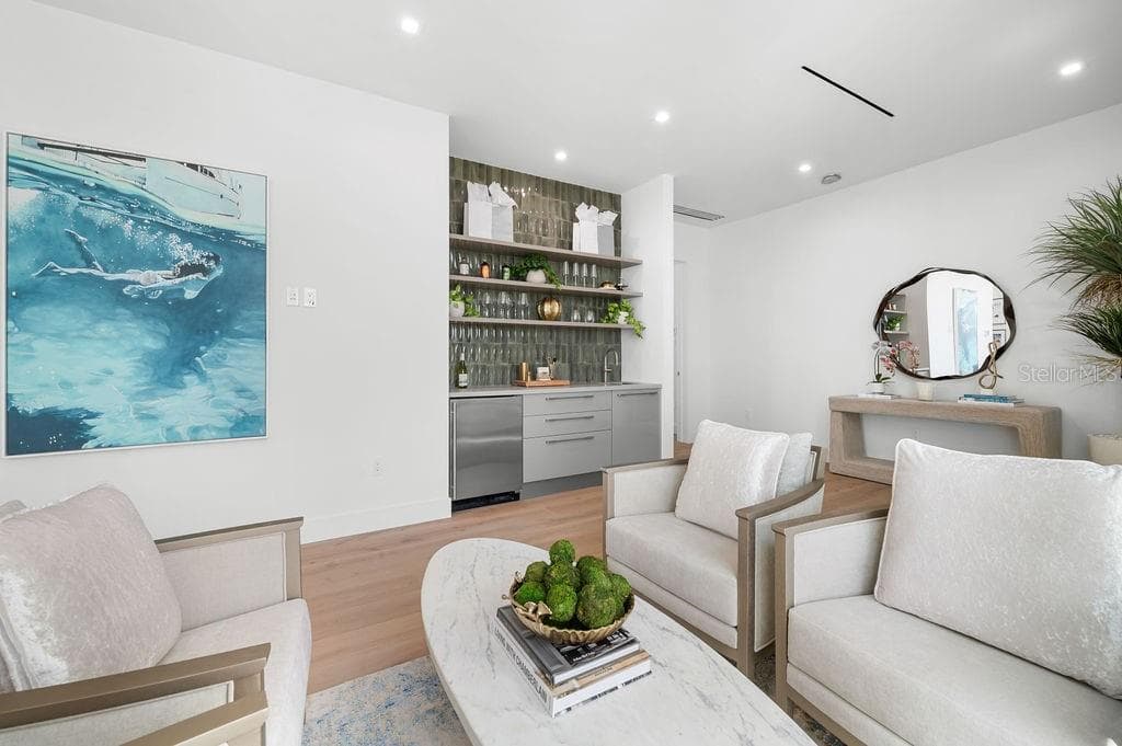 Second floor hosts a morning/evening bar and seating for a cozy conversation - 6489 GULFSIDE RD, LONGBOAT KEY