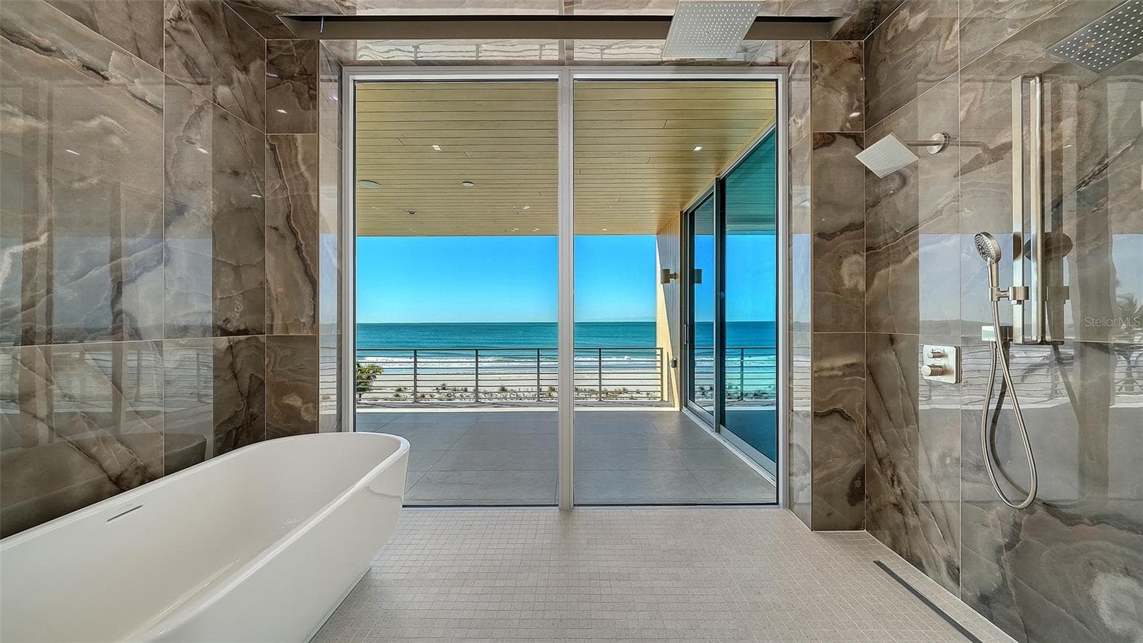 Primary Bathroom features wet room with Hansgroghe™ and Axor™ plumbing fixtures - 6489 GULFSIDE RD, LONGBOAT KEY
