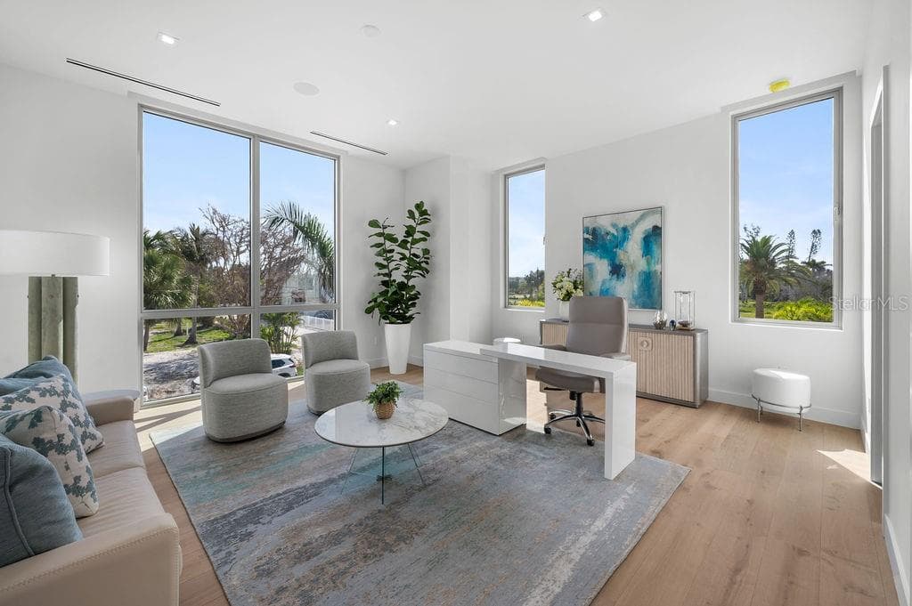 Bedroom 2 is shown as an office with floor-to-ceiling windows - 6489 GULFSIDE RD, LONGBOAT KEY