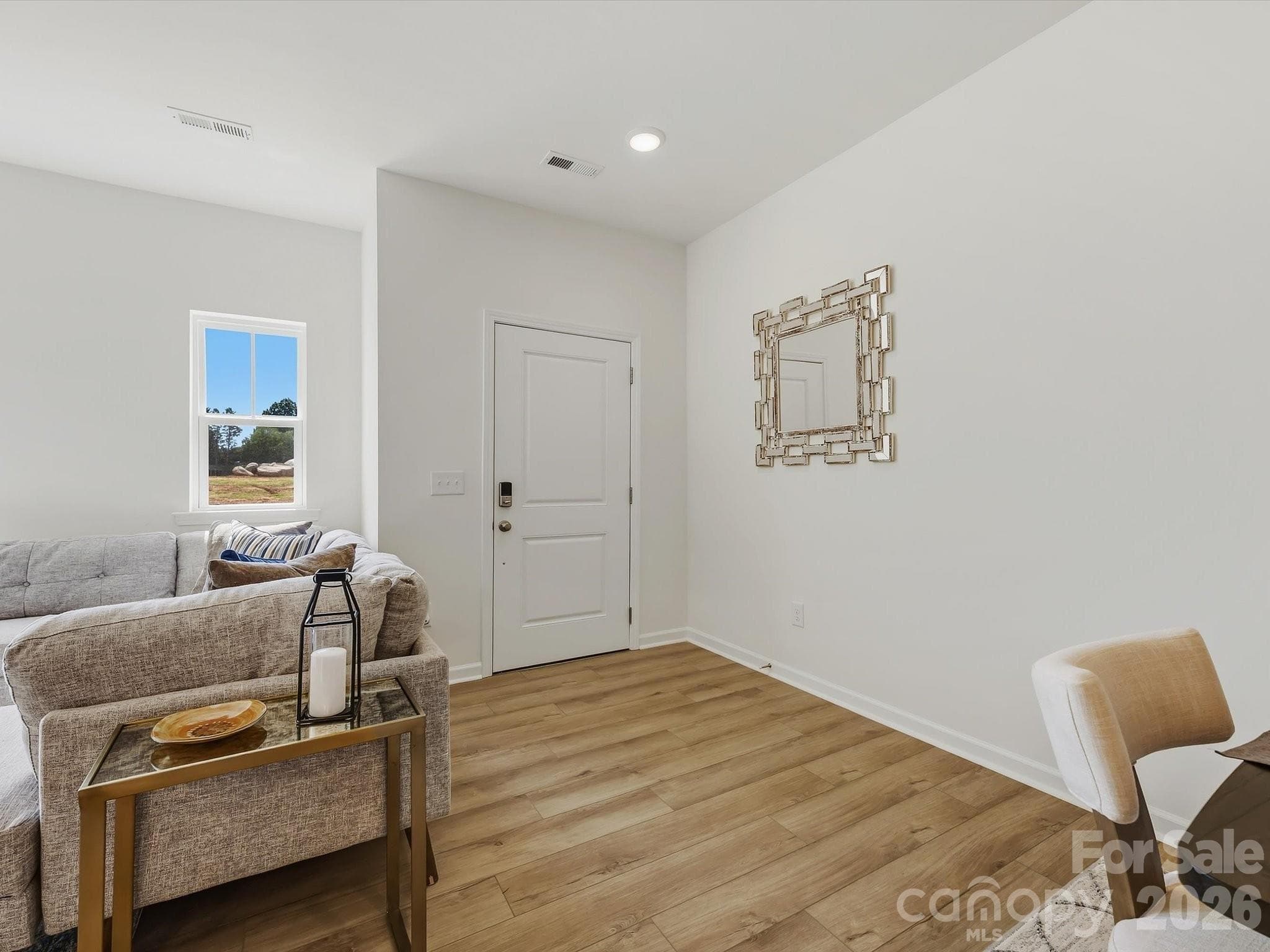 Rendering of Home Staged to Show Placement of Furniture - 6565 Fire Lily Lane, Charlotte