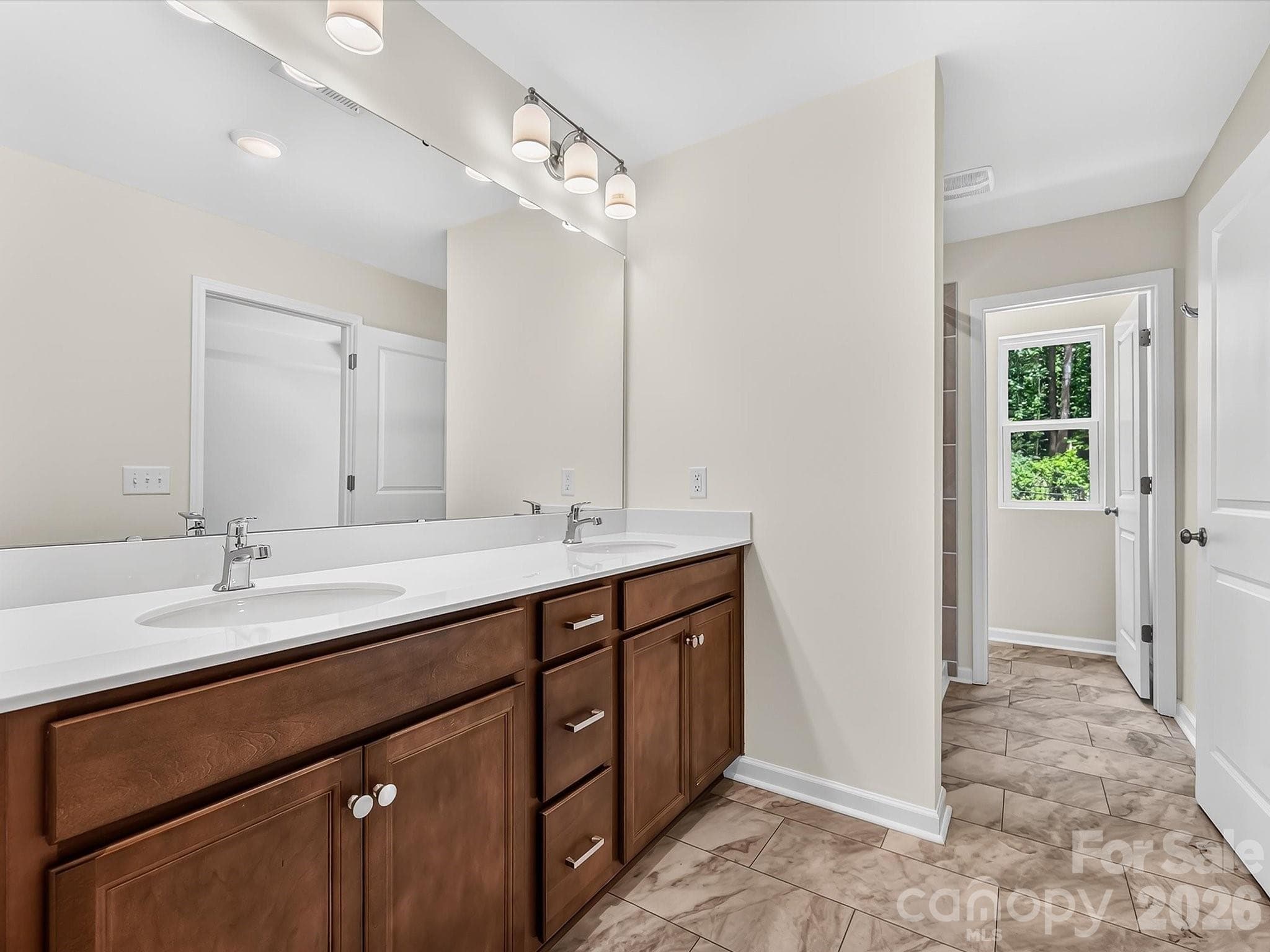 Double Sink Vanity in Owner's Bathroom - 6565 Fire Lily Lane, Charlotte