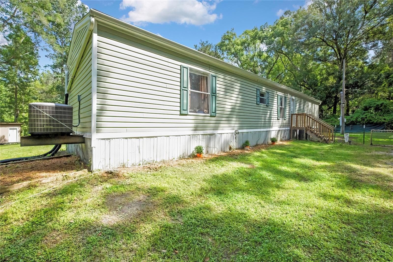 Manufactured Home at 19995 MANECKE RD, BROOKSVILLE, photo 8 of 25
