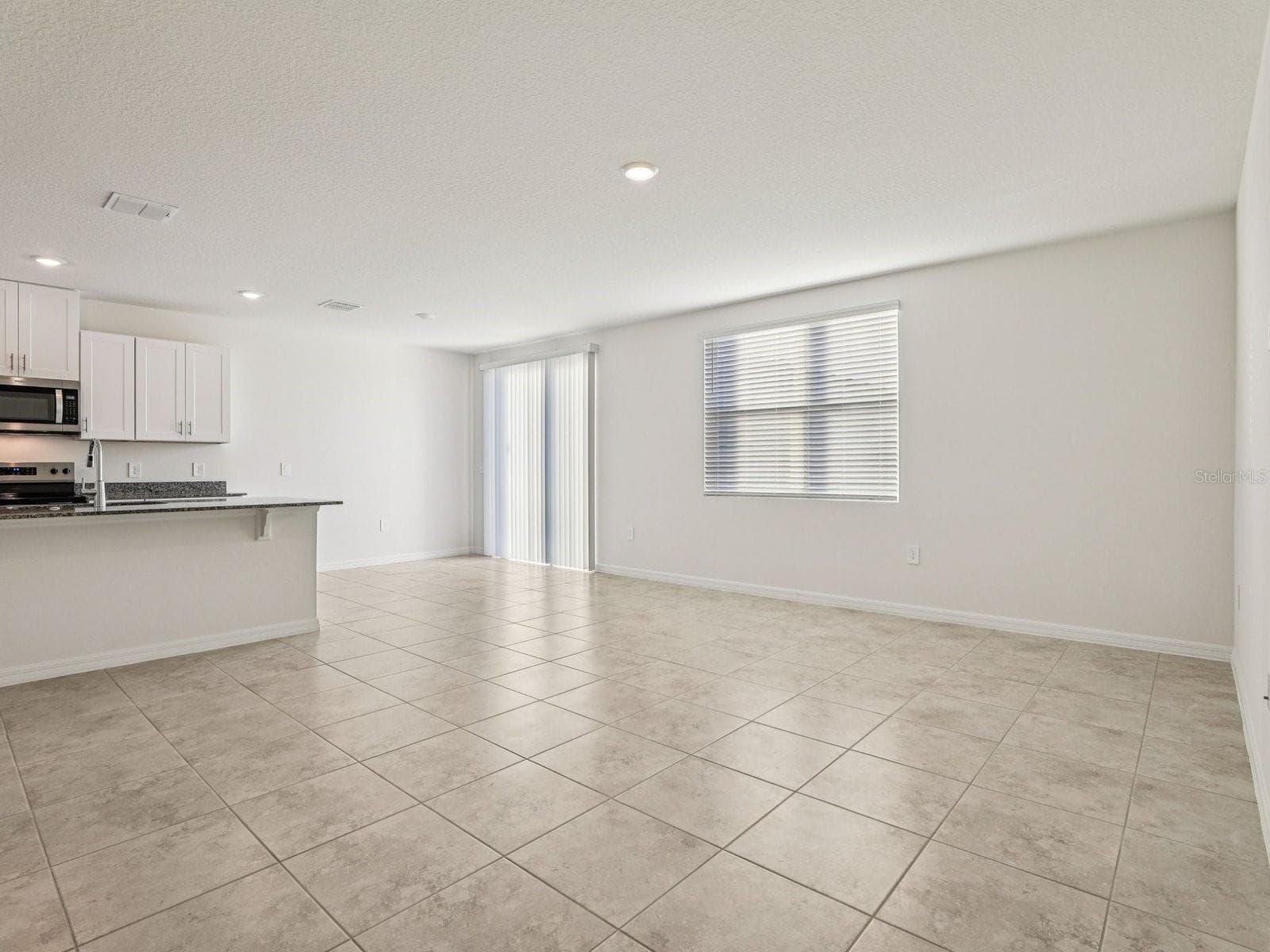 Photo is not of the actual home, but is an inspirational photo of builder’s model home and may depict options, furnishings, and/or decorator features that are not included - 12580 HOMELAND DR, DADE CITY