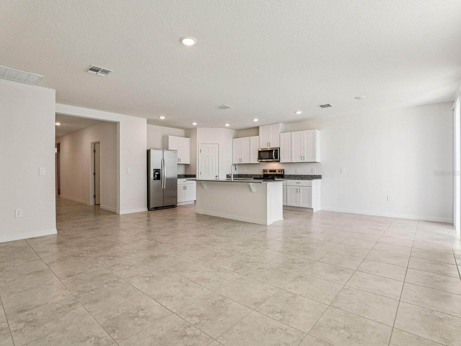 Photo is not of the actual home, but is an inspirational photo of builder’s model home and may depict options, furnishings, and/or decorator features that are not included - 12580 HOMELAND DR, DADE CITY