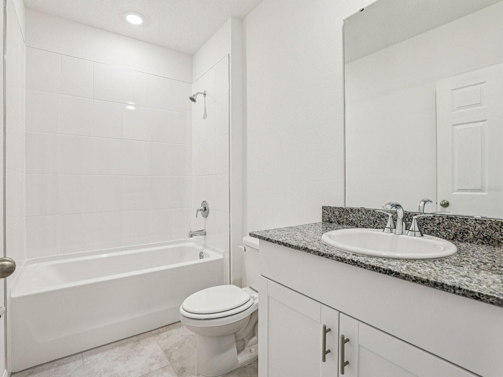 Photo is not of the actual home, but is an inspirational photo of builder’s model home and may depict options, furnishings, and/or decorator features that are not included - 12580 HOMELAND DR, DADE CITY