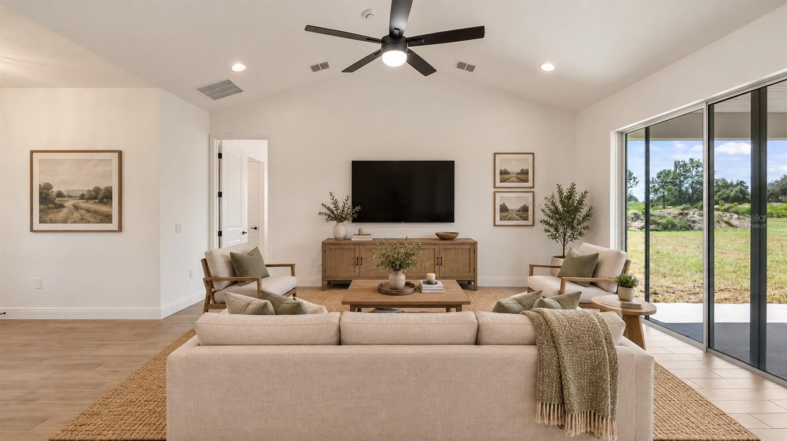 Great room virtually staged - 10720 PHILIPS LANDING CT, WEBSTER