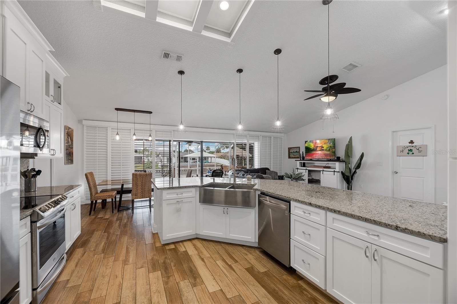 Plenty of drawer storage in this well thought out kitchen design and a double basin stainless steel apron sink. - 743 KINGSTON CT, APOLLO BEACH