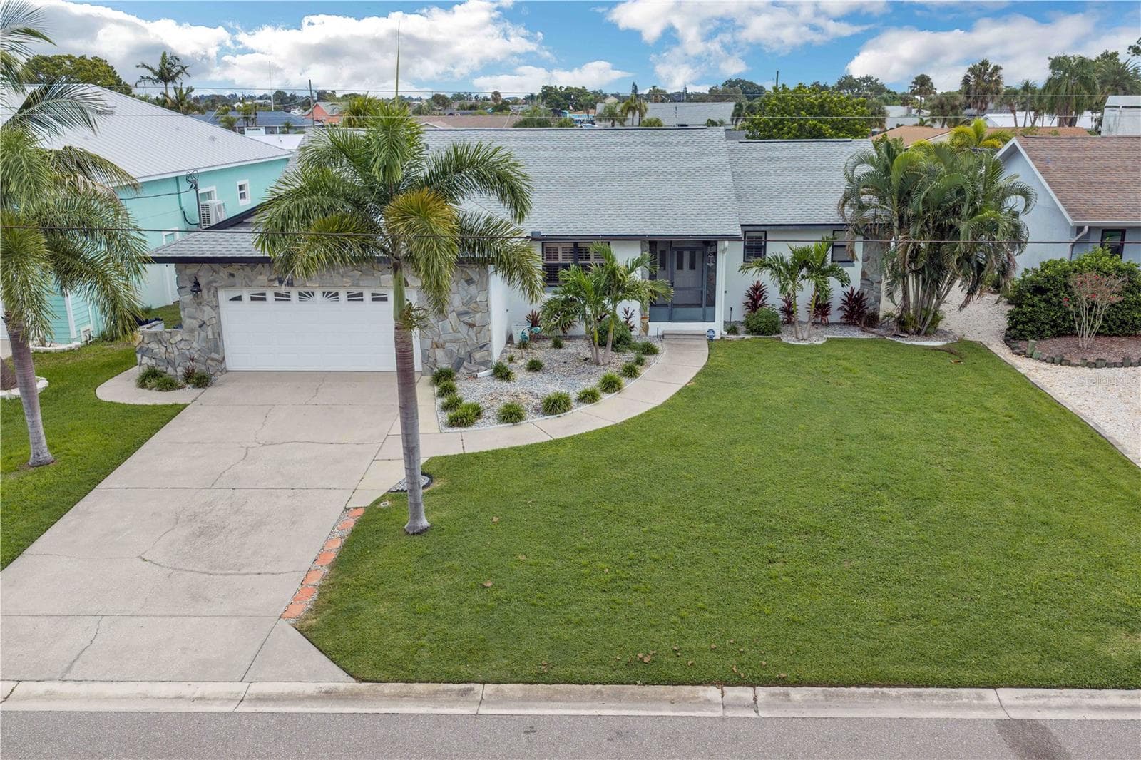 Significant Improvements & Updates upgraded roof, updated hot water tank, and numerous improvements completed in 2022, including a tiki bar, EVO PEX plumbing with larger supply lines and attic access, garage storage system, refrigerator, upgraded electrical subpanel, and scenic-view pool enclosure. - 743 KINGSTON CT, APOLLO BEACH