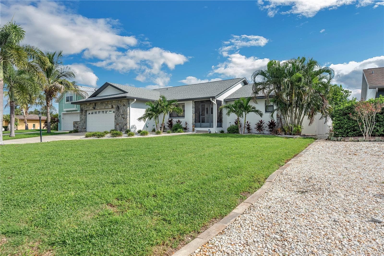 With its deep-water boating access, spacious outdoor living, heated pool, two docks, boat lifts, thoughtful floor plan, and extensive improvements, this home offers a rare opportunity to enjoy Florida waterfront living. - 743 KINGSTON CT, APOLLO BEACH
