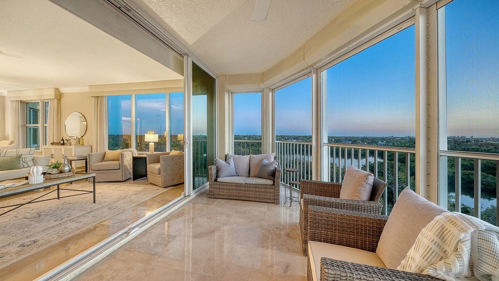 Lanai with sliders opening to living area - 385 NORTH POINT RD #701, OSPREY